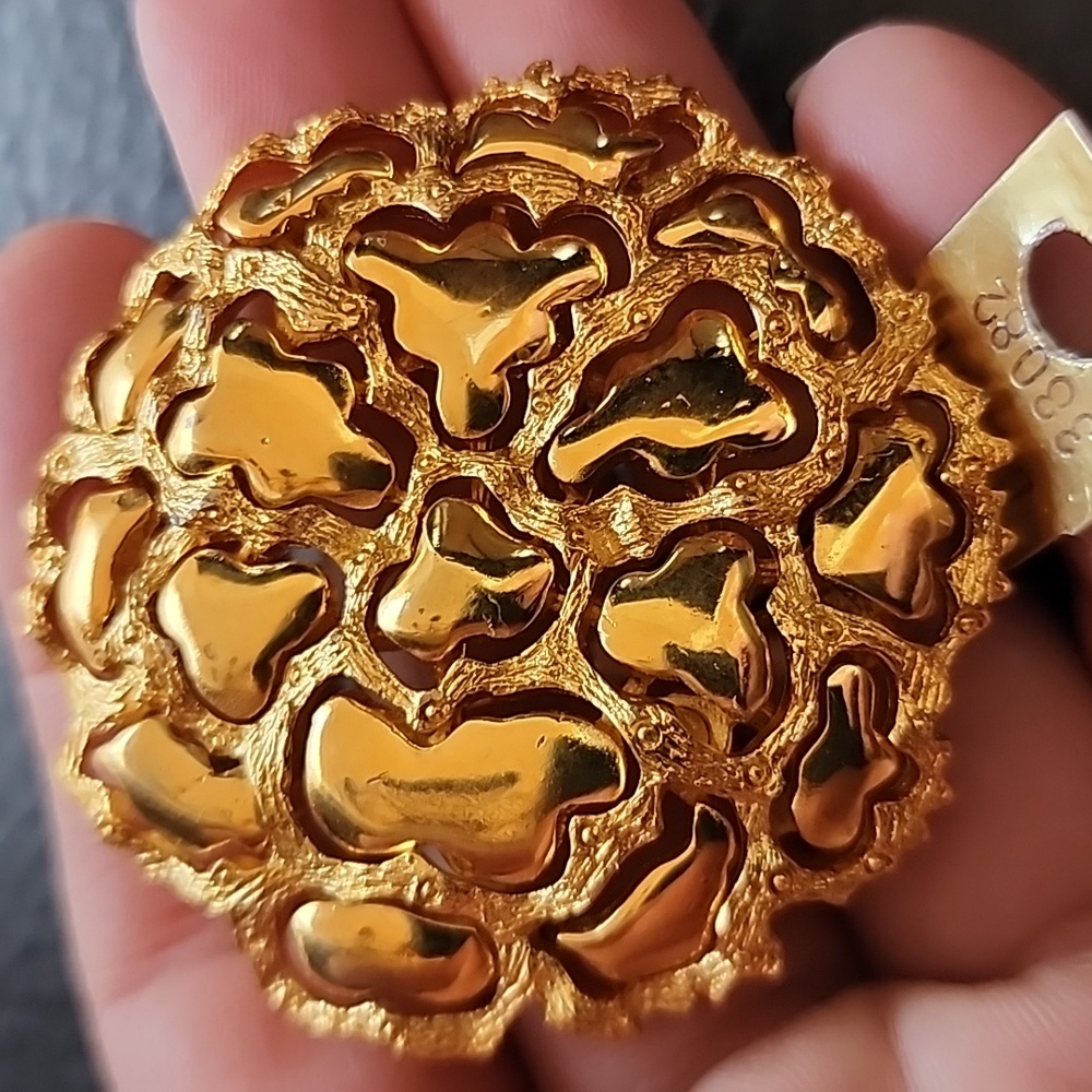 VTG Roget brooch